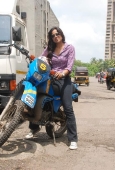 Sameera reddy learns to ride a bike - inditop.com