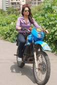 Sameera reddy learns to ride a bike - inditop.com10