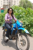 Sameera reddy learns to ride a bike - inditop.com11