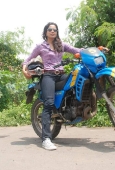 Sameera reddy learns to ride a bike - inditop.com14