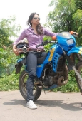 Sameera reddy learns to ride a bike - inditop.com15