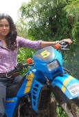 Sameera reddy learns to ride a bike - inditop.com18