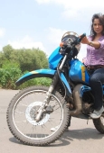 Sameera reddy learns to ride a bike - inditop.com29