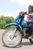 Sameera reddy learns to ride a bike - inditop.com30