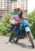 Sameera reddy learns to ride a bike - inditop.com6