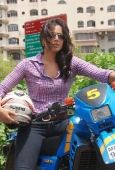 Sameera reddy learns to ride a bike - inditop.com8