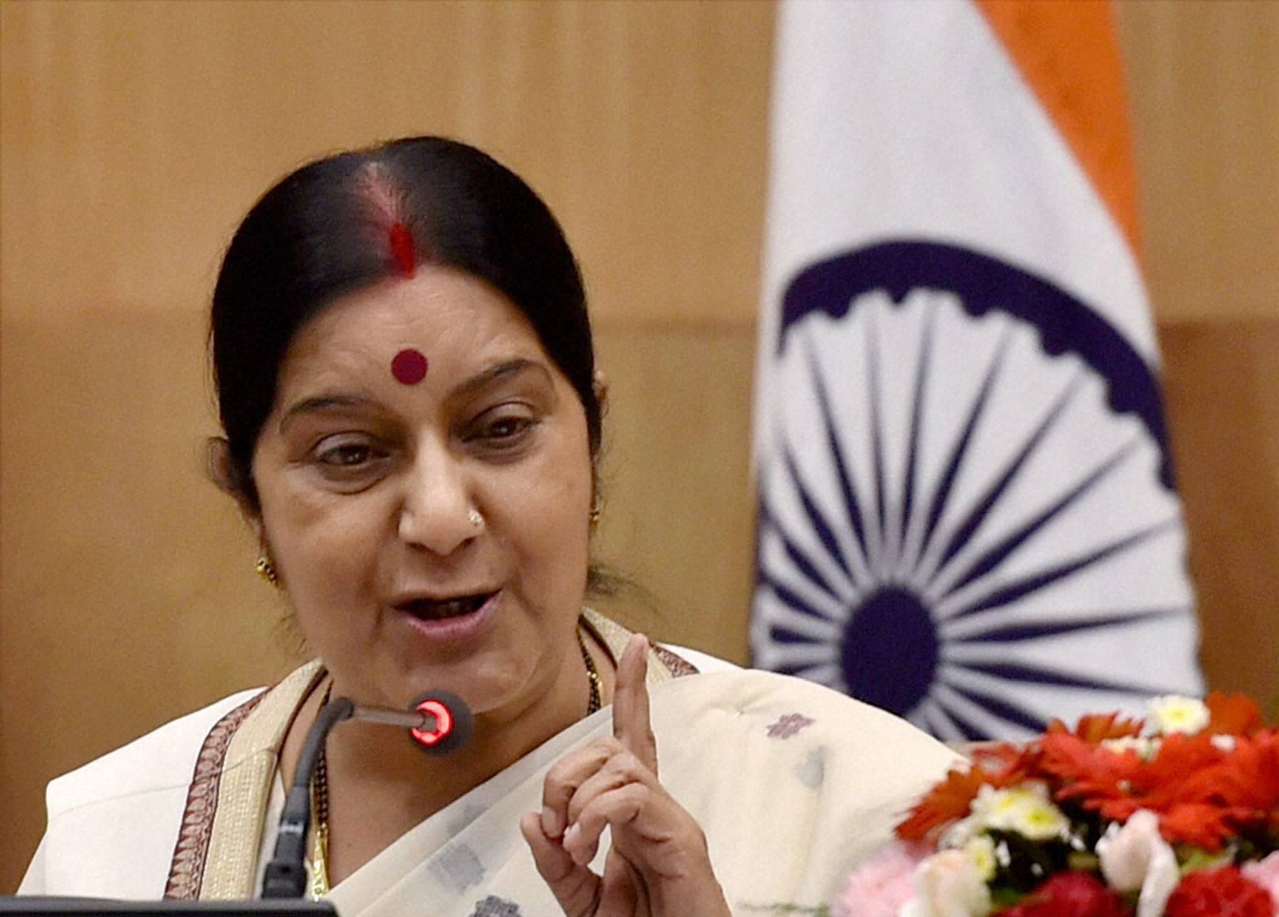 New Delhi: External Affairs Minister Sushma Swaraj addressing a press conference at Jawaharlal Nehru Bhawan in New Delhi on Monday. PTI Photo by Vijay Verma (PTI9_8_2014_000176B) *** Local Caption ***